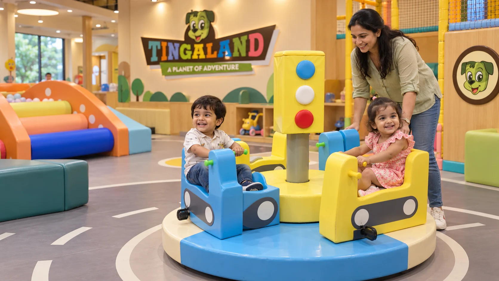 Toddlers enjoying the tingaland merry go round with a parent