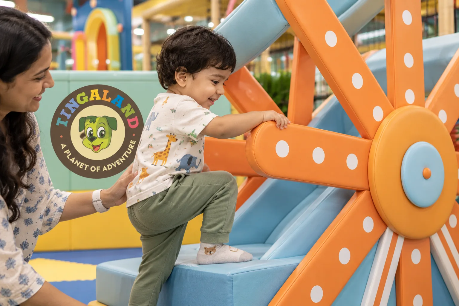 Toddler gripping the soft tingaland ferris wheel slide while climbing