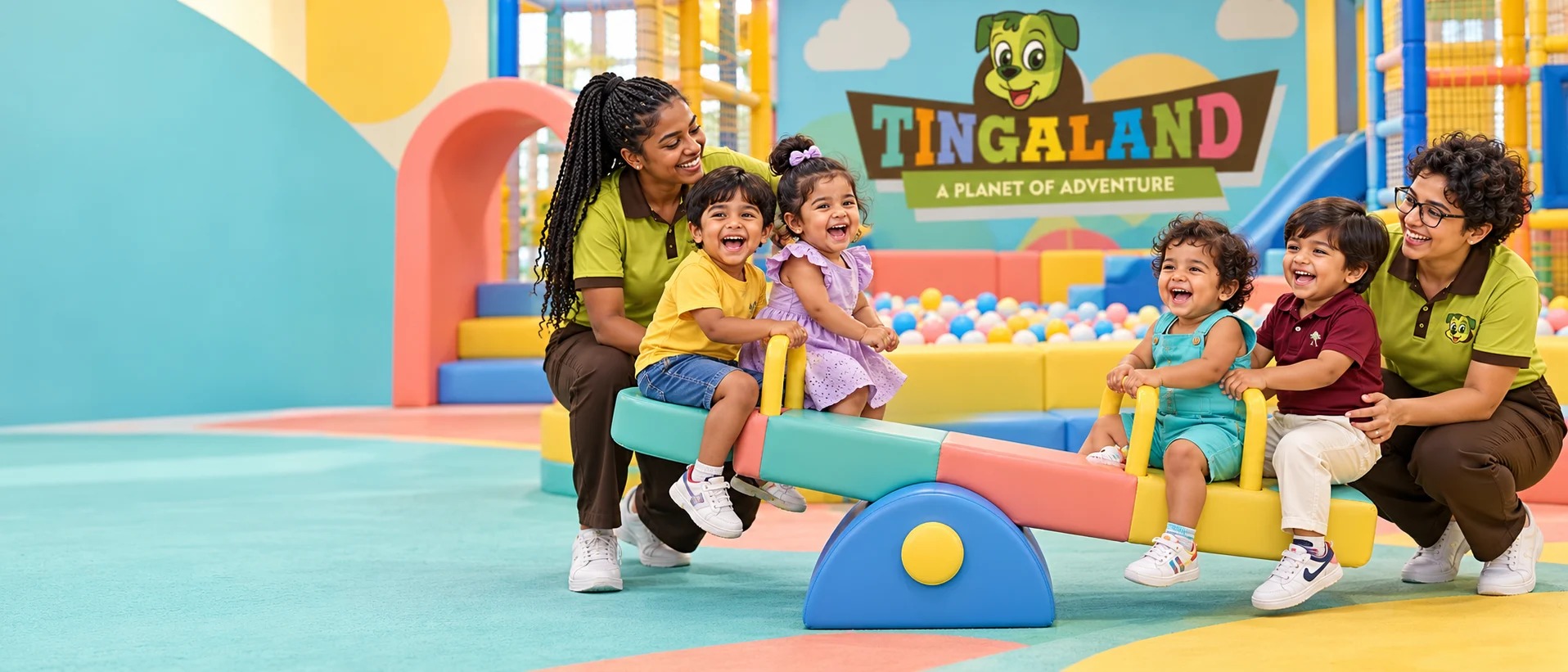 Four toddlers celebrate on the tingaland see saw with two distinct uniformed play attendants