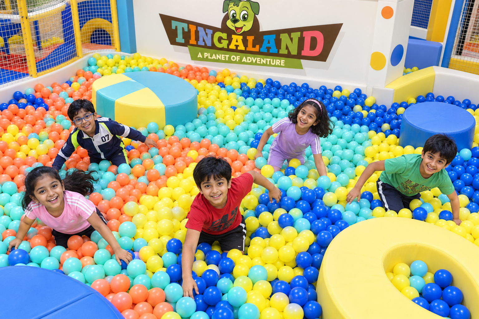 Ball pool 21 An overhead view of children making colourful trails through the ball pool