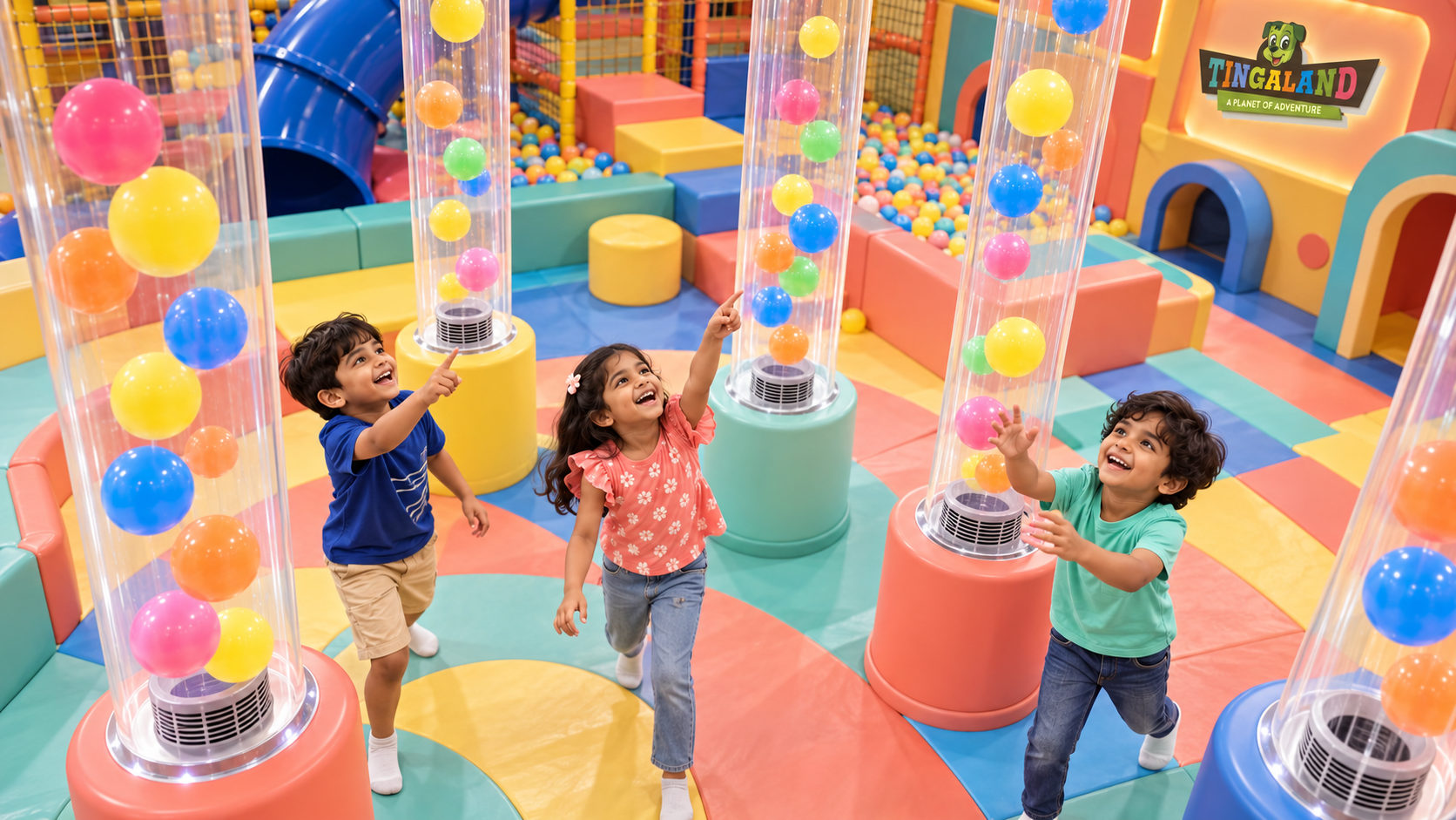Overhead view of children exploring colourful ball blower stations